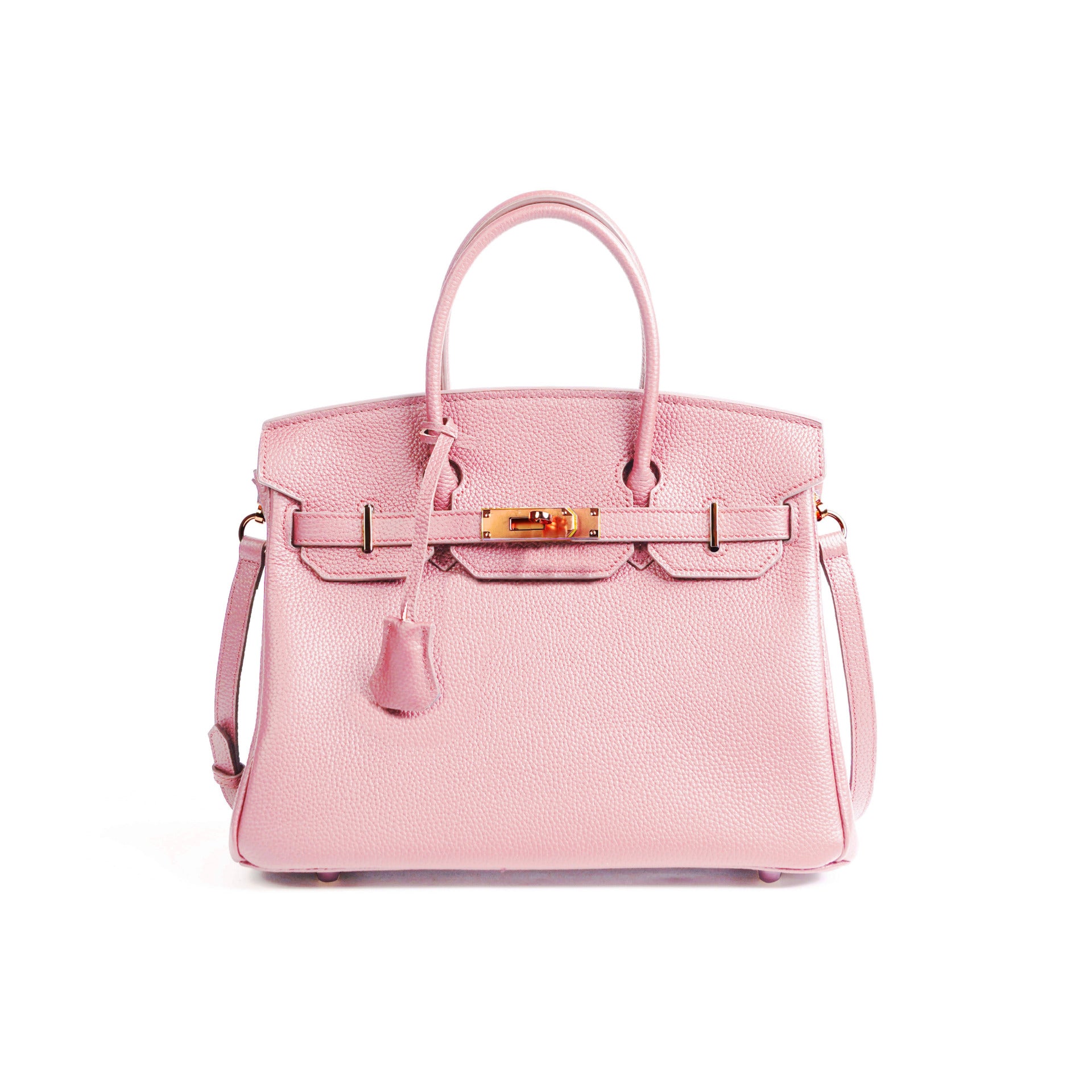 Pink handbag with gold hardware on a white background